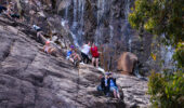 Waterfall hike Perth Hills | Group adventure on rocky trail WA